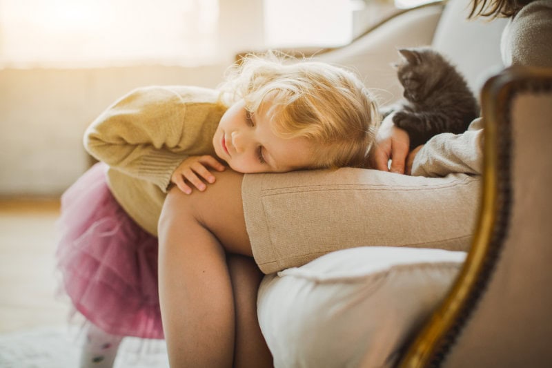 Best Indoor Air Quality (IAQ) Products for Hot Summer Weather. Kid on moms lap.